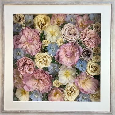 a flower wall preserved wedding bouquet in a frame