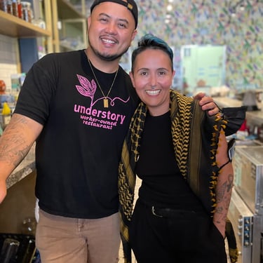 two understory collective participants standing in a kitchen