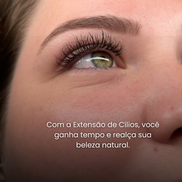 a woman with a large eyeliners and a green eyeliner