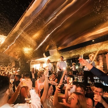 Zion Sky Lounge & Dining Ho Chi Minh Vietnam Saigon New Years Eve Celebration Bar area shoots Champagne toward crowd