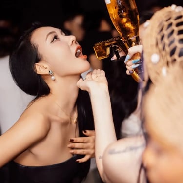 Zion Sky Lounge & Dining Ho Chi Minh Vietnam Saigon Ladies Night Bottle Girl shoots alcohol at Sexy girls mouth