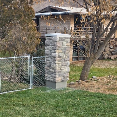 concrete block pillar with stone veneer