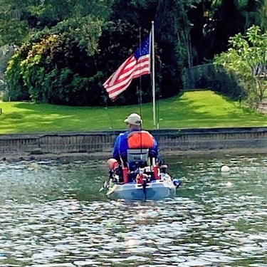 Kayaker with american flag