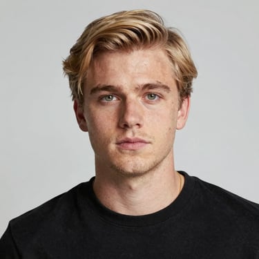 Elegant party decoration with pastel balloons and floral arrangements in a cozy living room.