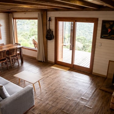 Living integrado com vista incrível para as montanhas de urubici em cabana para família