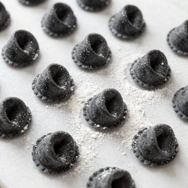Overhead macro shot of perfectly aligned handmade agnolotti on a white marble surface, dusting of semolina, clinical lighting, sharp focus, 35mm