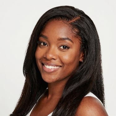 A smiling woman holding a tablet showing digital clipart designs in soft pastel colors.