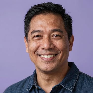A portrait of a warm and smiling North American person in their thirties, looking directly at the camera with a gentle and empathetic expression, soft studio lighting with lavender accents.
