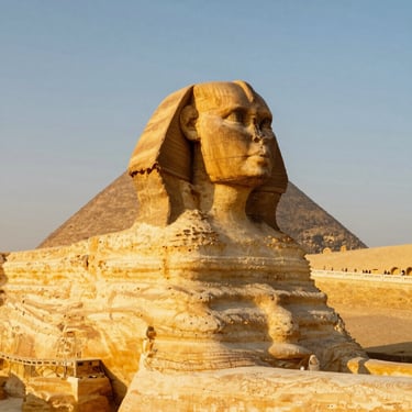 The Great Sphinx of Giza under a warm golden-hour sun, rich desert textures, sharp focus