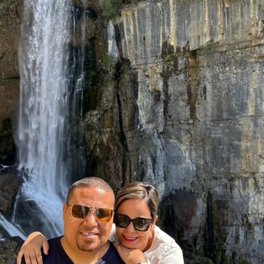 Visiting a waterfall in Switzerland