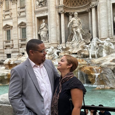My Wife and I in front of the Trevi Fountain