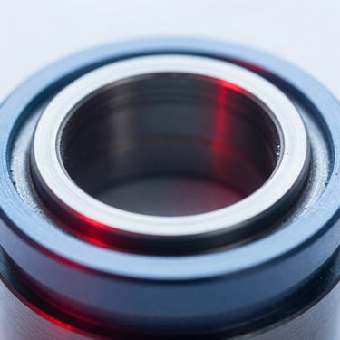Close-up of a high-precision Japanese mechanical seal, metallic surfaces, sharp focus, red accent light