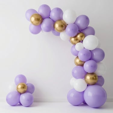 Elegant balloon arch for a baby shower in soft lavender, white, and gold colors, clean minimalist background