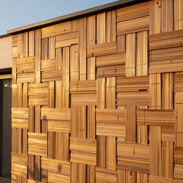 Seamless interlocking bamboo cladding installed on an exterior villa wall, golden hour sunlight