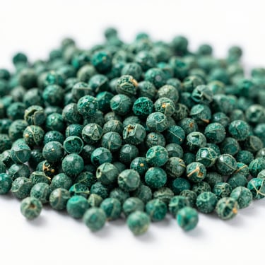 Macro shot of granular fertilizer pellets, clean white background, sharp focus, professional agricultural photography