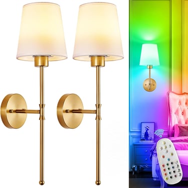 Set of two gold wall sconces with white fabric shades and color-changing RGB smart bulbs.