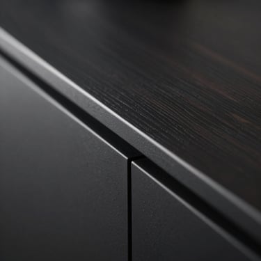 Macro shot of a sleek matte black cabinet runner, dramatic side-lighting emphasizing the clean industrial lines, shallow depth of field