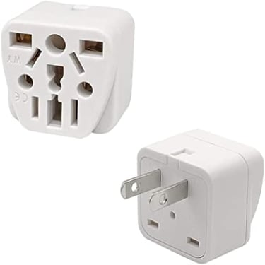 a white and black power plugged in a white wall