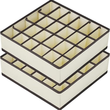 a stack of three boxes with a white box on top