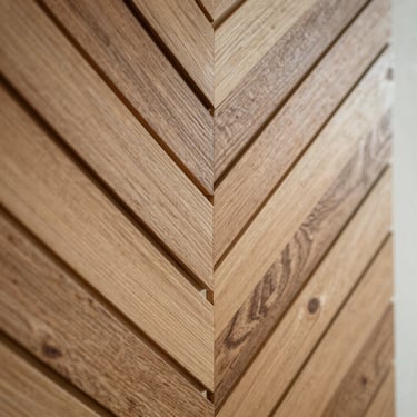 Geometric wooden wall art panel, reclaimed oak and pine in a chevron pattern