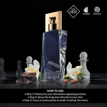 Avon Attraction Game for Her perfume bottle with amber and woody notes on a chessboard with white flowers.