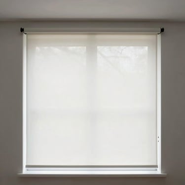 Clean white roller blinds hanging straight in a bright modern room, daylight