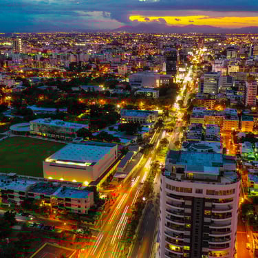 Santo Domingo city view at sunset with lights, buildings, and skyline in the Dominican Republic