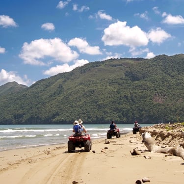 ATV beach adventure in the Dominican Republic with ocean and mountain views