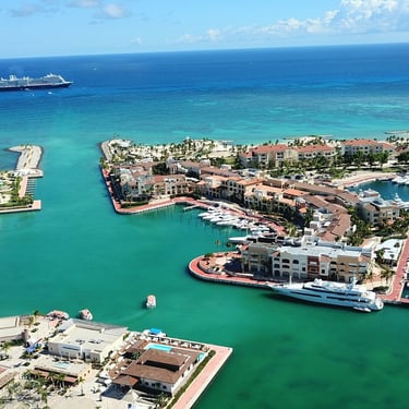 Luxury yachts and waterfront resorts at Marina Cap Cana, Dominican Republic