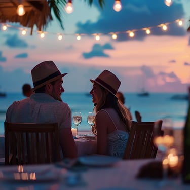 Romantic beachfront dinner in the Dominican Republic with wine, candlelight, and Caribbean sunset views