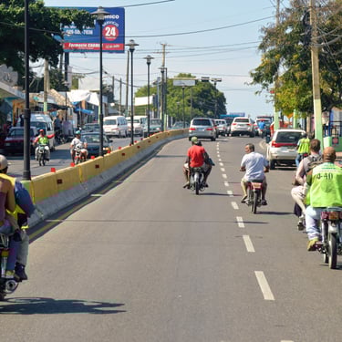Motoconchos and traffic on a busy street in the Dominican Republic