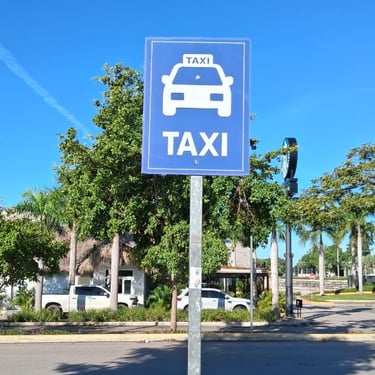 Taxi stand sign on a sunny street in the Dominican Republic