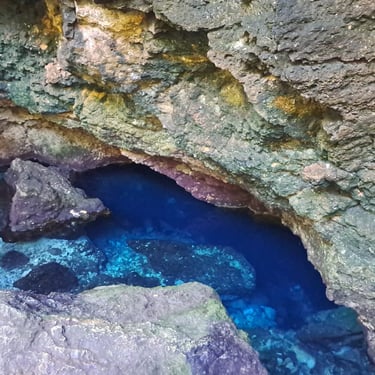 Hoyo Azulito cave pool with clear blue water in Boca de Yuma, Dominican Republic