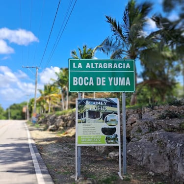 Welcome sign for Boca de Yuma in La Altagracia, Dominican Republic, by the roadside