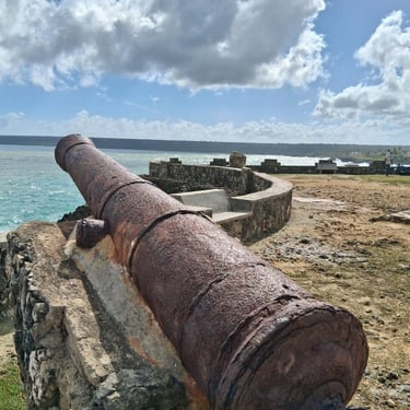 Historic cannon at Boca de Yuma overlooking the Caribbean Sea and coastal cliffs