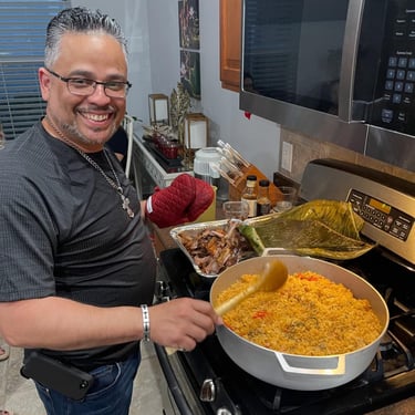 a man cooking arroz con gandules