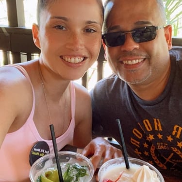 a man and a woman with tipical drinks in puerto rico