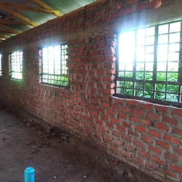 Alt text Picture of the windows going in.