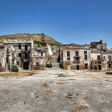 Ruins of Poggioreale ghost town in Sicily, Italy, abandoned after the 1968 earthquake under a bright summer sky