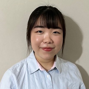 Photo of female chiropractor who gave a 5-star testimonial for graphic and leaflet design services