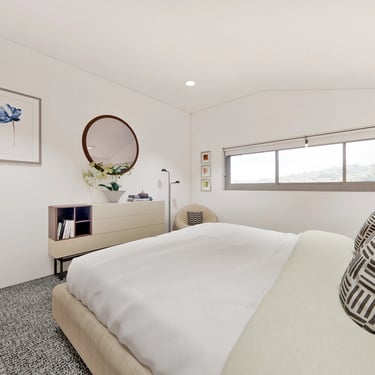 Simple, cozy, modern bedroom with simple finishes, vaulted ceiling and views to the forest
