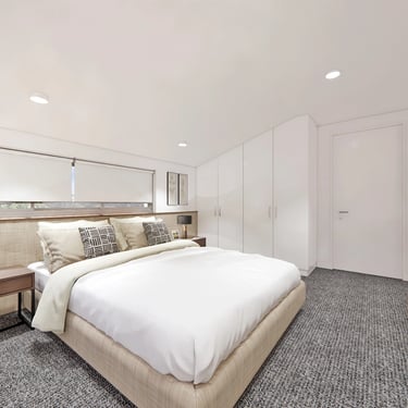 Contemporary bedroom in the Southern Highland Airbnb retreat featuring neutral palette finishes and custom joinery cabinets