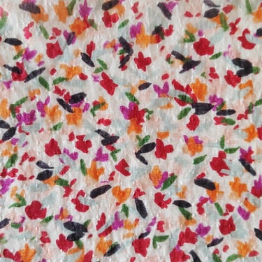 a close up of a colorful floral print fabric