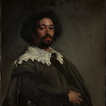a man with a beard and a hat