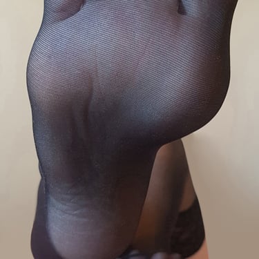 Mistress Nereid's foot-sole close-up in sheer black stocking