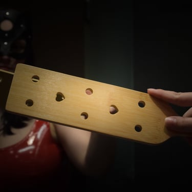Mistress Nereid and Her paddle's reflection in the mirror