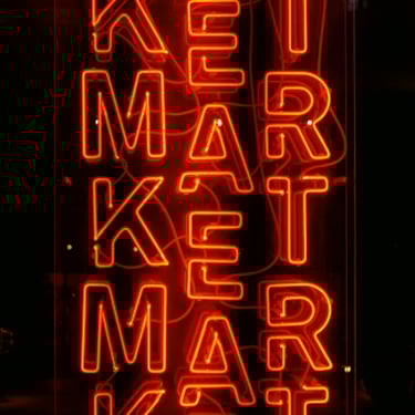 The word market in neon lights - AI Assisted Content - Video Localisation