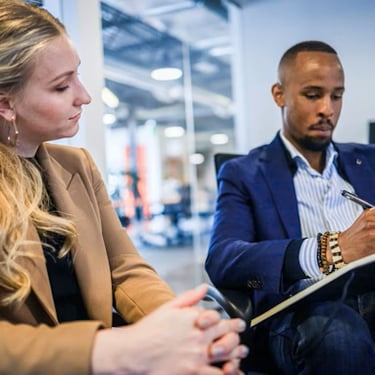 C-level executives in a meeting about AI Assisted Content, Video Localisation & Video Localization