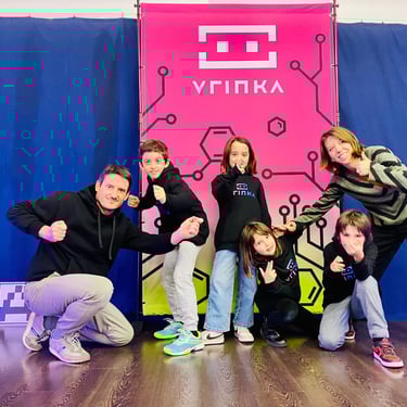 Una familia sonríe en un photocall de VRINKA