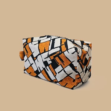Trousse de toilette et maquillage en wax beige orange noir à motifs africains